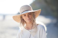 This awesome straw hat is made from Hand-Braided Organic Raffia -Harvested in Madagascar. Great for traveling being Lightweight and crushable! Beachy Sun Hat With Flat Brim For Travel, Beachy Flat Brim Sun Hat For Travel, Lightweight Beachy Hat With Flat Brim, Lightweight Beachy Hat For Day Out, Beachy Wide Brim Hat For Travel, Beachy Wide Brim Travel Hat, Lightweight Short Brim Sun Hat For Day Out, Lightweight Brimmed Sun Hat For Warm Weather, Lightweight Sun Hat With Short Brim For Day Out