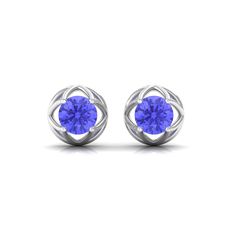 Product Details Enhance your style with these exquisite Flower Stud Earrings. Featuring a captivating design of round-cut Tanzanite gemstones arranged in a delicate flower shape, these earrings add a touch of elegance and sophistication to any outfit. A timeless and beautiful accessory for any occasion. Product Information SKU SHP-EARRINGS112116995 Length 6 mm Width 6 mm Height 4 mm Weight 0.96 gm (Approximate) TANZANITE INFORMATION No.of Stones 2 Pieces Total Weight 1.08 Carat (Approximate) Dim Formal Brilliant Cut Round Flower Earrings, Formal Brilliant Cut Flower Earrings, White Gold Flower Earrings With Prong Setting, Classic Round Flower Earrings For Anniversary, Formal Round Gemstone Flower Earrings, Formal Round Diamond Earrings With Birthstone, Classic Round Flower Earrings For Formal Occasions, Tanzanite Earrings, Flower Stud Earrings