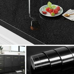 black counter top with gold trim and white sink in the middle, next to an image of a bowl of strawberries on a plate