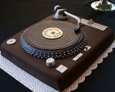 a cake that is shaped like a record player