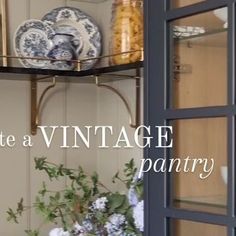 an antique pantry with plates and vases on it