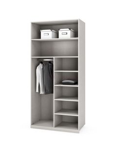 a white closet with shelves and clothes on it