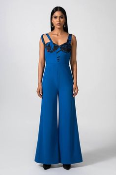 Blue bodycon jumpsuit with dual straps, A-line silhouette and print panel. - Aza Fashions Blue Spaghetti Straps Jumpsuits And Rompers, Blue Strapless Jumpsuit For Spring Party, Fitted Jumpsuits And Rompers With Adjustable Straps For Party, Fitted Jumpsuits And Rompers With Straps, Blue Strapless Jumpsuit For Spring Evening, Blue Strapless Jumpsuit For Evening In Spring, Blue Spaghetti Strap Jumpsuit For Party, Chic Fitted Blue Strapless Jumpsuit, Blue Fitted Strapless Sleeveless Jumpsuit