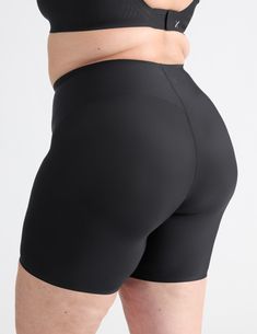 Thigh coverage helps prevent rubbing and chafing, plus a contouring panel provides gentle hold and support in the tummy area. Absorbs about 3 regular tampons’ worth. Comfortable enough to wear every day. Oh and they’re super smooth— no one will know you’re wearing them! | Knix Period Underwear Leakproof Contour Thigh Saver® 6” in Black Compressive Supportive Shapewear, Supportive Compression Shapewear, Supportive Workout Shapewear, Compression Full Coverage Shapewear For Sports, Sports Compression Shapewear Full Coverage, Compressive Full Coverage Shapewear With Light Support, Compressive Full Coverage Shapewear, Supportive Mid-thigh Length Bottoms, Solid Compressive Shapewear With Light Support