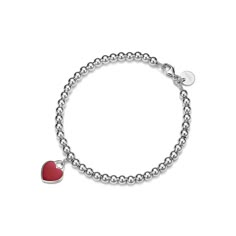 Inspired by a key ring we debuted in 1969, the Return to Tiffany collection is famous for its signature motif. This sterling silver bead bracelet features the iconic mini heart tag with a round brilliant diamond on one side and red enamel finish on the other for a playful pop of color. Make this standout silhouette part of your everyday bracelet stack. Sterling silver with a round brilliant diamond and red enamel finish; Size small; Fits wrists up to 5.75"; Motif size,mini; Carat weight .005 | R Bridal Jewelry Bracelets, Tiffany Bead Bracelet, Heart Bead Bracelet, Tiffany And Co Bracelet, Tiffany And Co Jewelry, Tiffany Bracelets, Silver Beaded Bracelet, Classic Love, Sterling Silver Bead Bracelet