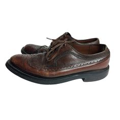 "Men's Vintage Leather O'Sullivan Oxford Wing Tip Dress Shoes Lace-Up Walnut Brown Made in Italy Size 11 ☆ SIZE: There is no size imprint on the shoes. Measurements fit an approximate Men's Size 11 US.  Please use the measurements below to determine size and fit. ☆ MEASUREMENTS (inches, item lying flat): ✄ Outsole Length (heel to toe):  12 3/4\" ✄ Innersole Length (heel to toe):  11 1/4\" ✄ Width (widest part of outer sole):  4 1/2\" ✄ Heel Height:  1\" ☆ COLOR: Dark Walnut Brown ☆ MATERIAL:  Ge Casual Brown Leather Shoes For Semi-formal Occasions, Masculine Brown Wingtip Leather Shoes, Masculine Brown Leather Wingtip Shoes, Classic Brown Low-top Dress Shoes, Masculine Brown Lace-up Oxfords, Brown Low-top Dress Shoes For Work, Masculine Brown Oxford Dress Shoes, Brown Dress Shoes With Leather Footbed, Brown Low-top Formal Dress Shoes