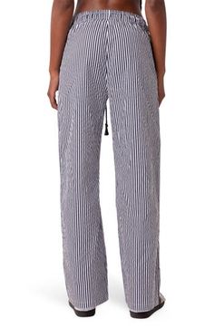 A low-rise drawstring waist tops these cute striped pants cut in an on-trend wide-leg silhouette. 100% cotton Machine wash, dry flat Imported Striped Cotton Wide Leg Pants, Striped Cotton Lounge Bottoms, Striped Cotton Loungewear Bottoms, Casual Wide Leg Bottoms With Vertical Stripes, Striped Beach Bottoms With Drawstring, Striped Drawstring Bottoms For Beach, Striped Drawstring Bottoms For Loungewear, Cotton Wide Leg Pants With Vertical Stripes, Cotton Wide Leg Trousers With Vertical Stripes