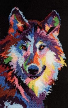 a colorful wolf is shown on a black background