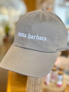 We love our hometown! The simplicity of this hat is perfect for the beach or a night out. One size fits all with adjustable strap Unisex Made from 100% Cotton Embroidered Baseball, Embroidered Baseball Caps, Terry Towel, Unique Materials, Santa Barbara, Corporate Gifts, One Size Fits All, Baseball Cap, Night Out