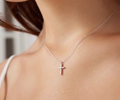 14K SOLID WHITE GOLD SMALL CROSS NECKLACE WITH DIAMONDS Here is a dainty, delicate and simple, yet classy minimalist Diamond Cross Necklace. This is 14k Solid Gold. (We do not sell filled or plated jewelry) Perfect for everyday use. Metal : 14K Solid Gold Necklace Length : 16 inches / 40cm Cross Height : 15mm Cross Width : 9mm Diamond : 11 Diamonds Each Diamond 1.5mm --- Nice White Color Sparkle Diamonds ---- G-H color SI2 clarity Total Carat: 0.17ct ---MADE IN USA--- ---Absolutely stunning. Com Minimalist Cross Pendant Necklace For First Communion, Elegant Pendant Necklaces For First Communion, Cross Necklace For First Communion, Cross Pendant Jewelry For First Communion, Minimalist Cross Necklace For Wedding, First Communion Cross Pendant Jewelry, Dainty White Necklace For First Communion, Delicate Cross Necklaces For Weddings, Delicate Cross Necklace For Wedding