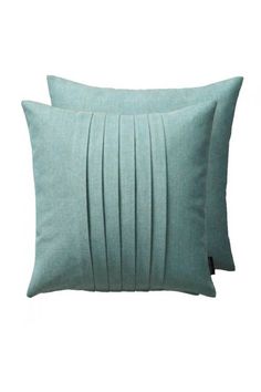 two light blue pillows with pleated edges