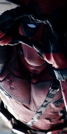 a close up view of the upper part of deadpool's armor and helmet