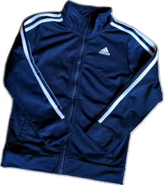 Sporty Navy Outerwear For School, Blue Adidas Track Jacket For Winter, Adidas Blue Track Jacket For Winter, Sporty Navy Adidas Outerwear, Casual Navy Adidas Outerwear, Adidas Navy Sports Outerwear, Navy Adidas Outerwear For Sports, Navy Adidas Sports Outerwear, Adidas Navy Outerwear For Fall