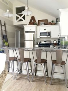 the kitchen is clean and ready to be used as a dining room or office space