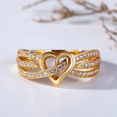 This statement of romance will make her day and illuminate her finger. Designed in yellow gold color, a lovely open heart shines at the center of the band, while rows of round stones glisten on the open shank. This band makes a stunning statement of everlasting love. #Engagement Rings #JeuliaJewelry #WeddingBand #Rings Heart Engagement, Diamond Bangles, Heart Engagement Rings