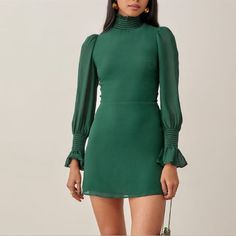 Never Been Worn. Two Small Flaws On L Shoulder Pictured. The Reformation Archie Dress In Emerald Green. There Are Two Tiny Pulls Near The Top Left Shoulder. See Photo. Size: 6 Approximate Measurements Length: 31" Pit To Pit: 16" Sleeve Length: 25" Reformation, Long Sleeves, Emerald Green, Date Night, Event Dress, Formal Perfect For Holiday, Thanksgiving, Formal, Absolutely Gorgeous On!! Archie Dress, Sleeved Velvet Dress, Long Dresses Casual Maxi, The Reformation, Mock Neck Mini Dress, Event Dress, Leather Mini Dress, Linen Mini Dress, Ribbed Mini Dress