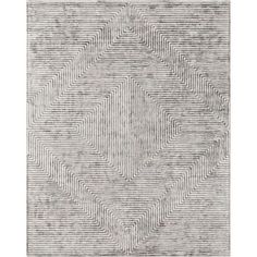 a gray rug with wavy lines on it