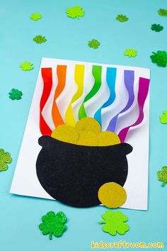 a st patrick's day card made out of paper with shamrocks and streamers