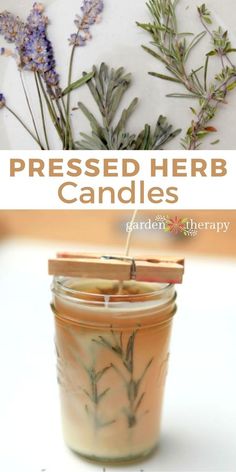 a jar filled with lavender and herbs on top of a white table next to a wooden stick