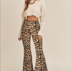 Animal Print Flare Leg Knit Pant Features Elastic Waistband For A More Comfortable Fit & Flare Leg Detail For A Fun, Flirty And Stylish Look. Tip: This Pant Is Perfect For Pattern Mixing. Follow Us On Instagram @Angeliquestylelounge.Com Leslie Is 5'7" Wearing A Medium Chic Leopard Print Bottoms For Fall, Chic Stretch Leopard Print Bottoms, Spring Stretch Bottoms In Leopard Print, Spring Leopard Print Stretch Bottoms, Fitted Leopard Print Pants For Fall, Spring Stretch Leopard Print Bottoms, Casual Fitted Leopard Print Bottoms, Fitted Beige Bottoms For Fall, Flare Leg Pants