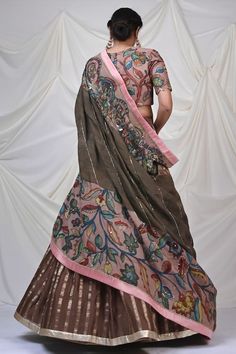 Brown attached cancan lehenga with floral stripe woven motifs. Paired with Ashta Laxmi kalamkari hand painted blouse and dupatta. - Aza Fashions Designer Cotton Silk Lehenga With Sheer Dupatta, Designer Cotton Silk Lehenga With Traditional Drape, Designer Cotton Silk Lehenga In Traditional Drape, Designer Embroidered Lehenga For Festivals, Embroidered Cotton Silk Lehenga For Designer Wear, Designer Embroidered Lehenga For Reception, Designer Choli With Dupatta For Festivals, Embroidered Cotton Silk Lehenga, Designer Wedding Pre-draped Saree With Dupatta