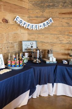 there is a table with coffee and bar signs on the top, along with other items