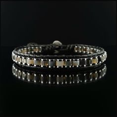 This handmade natural gemstone bracelet made with 2*4 mm roundel black and gray agate with 1*4mm silver color Hematite. It is a perfect gift for you and all your loved one for all special days. All our designs prepared by hand according to the your given sizes with love. Wrap is durable 1,5 mm polyester black rope. For closure of our high quality bracelet we used zamak alloys button with 2 optional closure buttonhole. We offer 8 size option between 5.9-8.7 inches (15-22 cm) , please DM us to demand different wrist size. Used Materials; 4*2 mm black and gray agate  4*1 mm hematite 1 cm zamak alloys button 1.5 mm black korean rope ☆ABOUT US☆ https://www.etsy.com/shop/SevenArtJewelry?ref=listing-shop2-all-items-count#about ☆OUR POLICIES☆ https://www.etsy.com/shop/sevenartjewelry#policies Than Modern Adjustable Onyx Bracelet, Modern Silver Beaded Bracelet With Black Beads, Modern Silver Bracelet With Black Beads, Modern Adjustable Onyx Beaded Bracelets, Modern Adjustable Beaded Bracelets With Natural Stones, Black Korean, One For All, Bracelets Design, Grey Agate