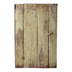 an old wooden door with nails on it