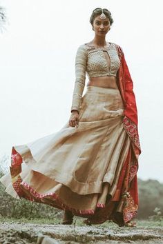 Shop for Rajiramniq Gold Tissue Chanderi Blouse And Lehenga Set for Women Online at Aza Fashions Raw Silk Lehenga With Long Sleeves For Reception, Designer Beige Choli With Traditional Drape, Wedding Saree In Raw Silk With Long Sleeves, Festive Beige Choli With Traditional Drape, Long Sleeve Raw Silk Choli For Wedding, Wedding Long Sleeve Raw Silk Choli, Traditional Beige Choli With Sheer Dupatta, Beige Choli With Sheer Dupatta In Traditional Drape, Long Sleeve Lehenga For Transitional Reception