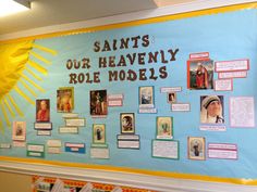 a bulletin board with pictures and notes on it that says saints our heavenly role models