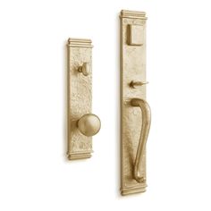 an antique brass door handle and knob on a white background