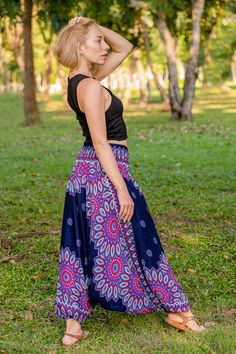 Part of our harem pants range, these blue Lotus pants are baggy sarouel style pants which double as a jumpsuit. In short, they’re at once stylish, versatile and practical. 
 
Pattern 
Inspired by the iconic lotus flower, a Thai spiritual symbol, these pants are adorned with petals on the waist and the lower legs. A bold print on a solid color are what makes them so dazzling. 
 
100% Vegan & Fairtrade 
Made from vegan-friendly Thai bamboo, these rayon pants are super soft and kind on the environm Harem Pants Diy, Fisherman Pants, Lotus Print, Hippie Pants, Blue Lotus, Rayon Pants, Style Pants, Bold Prints, Lotus Flower