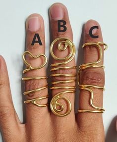 Trigger Finger Rings, Arthritis Ring, EDS Finger Splint Rings, Mallet Finger Rings, Adjustable Ring, Personalized Gifts, Unique Rings Size:- All Size Available In Variation Metal:-Brass 👇 If you have any question about size, then definitely go through it 👇 If you're knuckle is swollen, we recommend you Please tell me above and below size of your knuckle. Send me the photo of the finger in which you want to wear this ring. Write the above and below size of your knuckle in the Personalization box. I want to say one thing, do not adjust the ring after getting the order. This may lead to a breaking or distorted ring. And it's not my responsibility. And if there is any problem in size contact me. ❥ Customers satisfaction is our biggest priority, please contact us with any questions/queries fo Adjustable Spiral Gold Midi Rings, Artsy Gold Wire Wrapped Jewelry, Adjustable Gold Toe Rings, Unique Gold Toe Ring For Gift, Unique Gold Toe Rings As Gifts, Handmade Gold Open Toe Rings, Mallet Finger, Finger Splint, Rings Adjustable