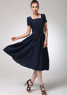 "This lovely pleated navy blue dress goes easily from day to night. With its square neckline, short sleeves and fitted waist. this charming midi linen dress flawlessly tailored from the finest quality linen blend, the pleats lay flat but still give the skirt a full swing. The perfect midi length for work or a semi formal event. DETAIL * 50% linen , 50% cotton blend * Classic and beautiful color * Fitted waist to show off your curves * Has no pockets (can't add) * Square neckline * Short sleeves Blue Linen Dress, Navy Blue Midi Dress, Tailored Clothes, Marine Uniform, Dresses Australia, Navy Blue Linen, Cottagecore Dress, Cotton Linen Dresses, Linen Midi Dress