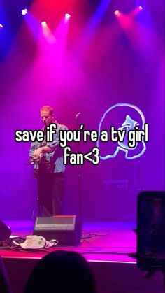 a man standing on top of a stage next to a purple and blue background with the words save if you're a tv girl fan - 3