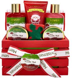 the christmas gift basket includes hand and body lotion, soaps, and more