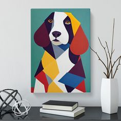 a painting of a dog is on the wall next to a vase and some books