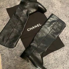 Chanel Black Leather Boots Size 37.5 Excellent Condition Leather Boots No Holes Tears Leather Is In Great/Excellent Condition Luxury Low Heel Leather Boots, Luxury Textured Leather Boots, Luxury Boots In Textured Calf Leather, Luxury Textured Calf Leather Boots, Designer Flat Heel Boots For Work, Designer Calf Leather Boots With Flat Heel, Designer Low Heel Calf Leather Boots, Designer Calf Leather Boots Medium Width, Designer Black Low Heel Boots