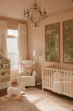 a baby's room with a crib, rocking horse and chandelier