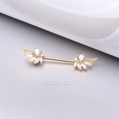 Add a touch of celestial elegance to your look with our Golden Guardian Angelic Wing Sparkle Nipple Barbell. These stunning barbells feature delicate golden wings and sparkling accents that will make you feel like a heavenly being. Perfect for adding some sparkle to any outfit. View More Colors/Styles Material: 316L Stainless Steel Gold Plated Suitable for Nipple Ear Piercings (Transverse Lobe) It is always recommended to know your exact piercing size to ensure fitment, safety, and comfort. Plea Transverse Lobe, Earring Stack, Being Perfect, Golden Wings, Cute Piercings, Body Piercing Jewelry, Piercing Jewelry, Ear Piercings, Animal Crossing