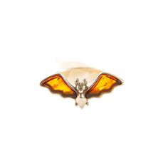 Add Some Spooky Charm To Your Halloween Look With Our Baltic Cognac Amber Dracula Bat Ring. Made With High-Quality 925 Sterling Silver, This Ring Features A Detailed Cute Bat Face And Body, Complete With A Big Wing Span. Perfect For The Spooky Season, This Ring Is A Must-Have For Any Halloween Lover. Dimensions: 24.9mm X 11.3mm Band Width: 2.3mm Total Weight: 2.69g Made In Poland Cute Dracula, Bat Face, Bat Ring, Cute Bat, Halloween Looks, Amber Jewelry, Brown Silver, Baltic Amber, Dracula