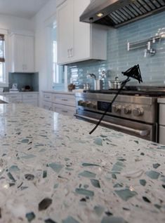 the kitchen counter is clean and ready to be used as a stove top or countertop