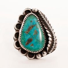 Awaiting your purchase is this Navajo Native American sterling silver ring crafted by Orvile Tsinnie in this wonderful scalloped applied leaf rain drops design featuring green turquoise. This special item remains in Excellent condition. Size / Item Length: 5.75 Width: 33.9 mm Stone Dimensions (MM): 23.7 x 15 mm Weight: 12.78 g ------------------------------- TERMS OF SERVICE: - All of our stones are natural earth mined stones, unless stated otherwise. -We have tested all stones & metals that we Vintage Concho Ring Jewelry, Southwestern Style Teardrop Turquoise Ring In Sterling Silver, Handmade Southwestern Teardrop Turquoise Ring, Bohemian Oval Stamped Jewelry, Western Green Turquoise Ring In Sterling Silver, Bohemian Green Stamped Jewelry, Collectible Bohemian Teardrop Jewelry, Bohemian Teardrop Collectible Jewelry, Vintage Teardrop Patina Jewelry