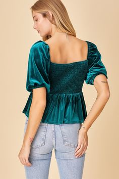 This beautiful velvet top is perfect for winter! Wear it for Christmas or New Years and all winter long! It has a flattering sweetheart neckline and puff sleeves. So flattering on any body type! Fits true to size - model is wearing a size small.100% Cotton Green Velvet Top, Velvet Top, Babydoll Top, Velvet Tops, Khloe Kardashian, Green Velvet, Glasses Accessories, Winter Wear, Custom Items