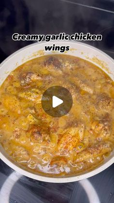 a white bowl filled with food on top of a stove