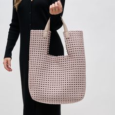 Introducing the Zenith Zen tote, a perfect blend of practicality and style. This beautifully crafted accessory boasts a distinctive woven texture that offers both durability and a touch of understated elegance. It's spacious enough to carry all your essentials with ease, whether you're heading to the office, going out for a casual brunch, or embarking on a weekend adventure. The robust handles ensure comfort and longevity, while the sleek design complements any outfit. Complete with a secure zip Everyday Woven Leather Crochet Bag, Modern Natural Hobo Bag For Everyday Use, Everyday Rectangular Intrecciato Shoulder Bag, Everyday Intrecciato Weave Rectangular Shoulder Bag, Modern Bucket Bag With Intrecciato Weave For Everyday, Modern Straw Bag For Everyday Use, Modern Natural Bucket Bag With Braided Handles, Modern Natural Bucket Bag For Shopping, Chic Everyday Handwoven Hobo Bag