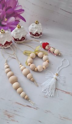 several wooden beads and decorations on a table