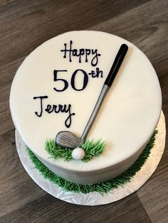 a birthday cake with a golf theme on the top and happy 50th written in white frosting