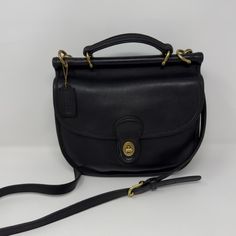 VERY VERY VERY RARE Authentic 1996  Sherbourne #9987 Style is a limited edition Sherbourne from 1996.  Very similar to a Willis or a Plaza bag. Measures approx. 10" H x 10.5" W X 4" D Classic Formal Crossbody Shoulder Bag, Classic Satchel With Top Carry Handle, Vintage Crossbody Work Bags, Classic Shoulder Bag With Detachable Handle, Classic Formal Satchel Shoulder Bag, Classic Formal Shoulder Satchel, Classic Shoulder Bag With Gold-tone Hardware, Vintage Bags With Detachable Strap For Work, Vintage Top Handle Bags For Work