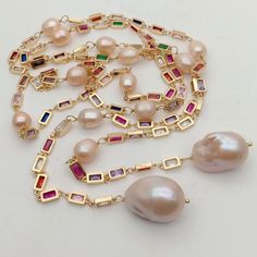 "Fresh water cultured pearl, pink pearl and keshi pearl, multi color rectangle Cz pave chain. Diameter:  16x24mm(keshi pearl), 9x11mm(pearl), 5x8mm(crystal). length:  50\"(necklace).  Comes with gift bag" Pearl Bangles Gold, Colar Chocker, Classic Pearl Necklace, Biwa Pearls, Pearl Chain Necklace, Freshwater Pearl Jewelry, Pearl Bangle, Kesha, Pearl Jewelry Necklace